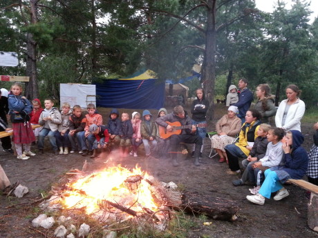 Singing around the campfire at summer camp