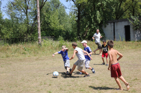 Our 'boys in blue' going at it on the soccer field 