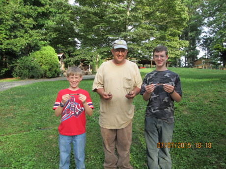 Sashko and Yurko with Pastor Sizemore who taught them to turn pens