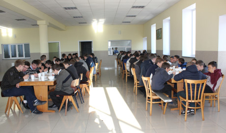 Lunchtime in the fellowship hall of the local Baptist church.